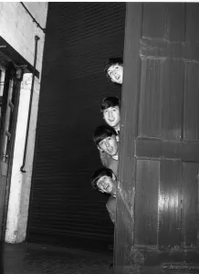 Quirky Prints: The Beatles peering out from behind a door. before the groups appearence at Sunday Night