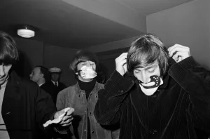 00106 Prints: The Beatles before performing at the Ardwick Theatre after a delayed journey leaving them