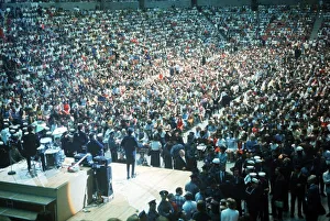 Beatles Colour Prints: The Beatles play to a packed out Seattle Center during their second tour of the USA