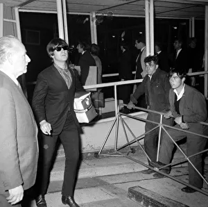 00084 Prints: The Beatles - Pop Group - September 1964 John Lennon at the Airport