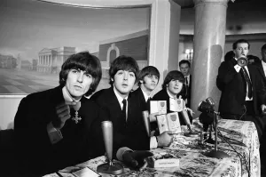 Honours Prints: The Beatles pose with their MBEs at a press conference held at the Saville Theatre