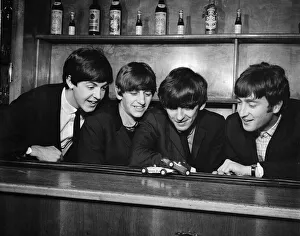 The Beatles race toy Scalextric cars between performances at the Coventry Theatre