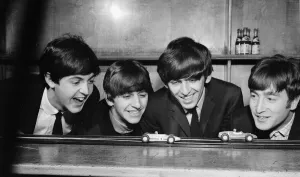 Group Shot Prints: The Beatles race toy Scalextric cars between performances at the Coventry Theatre