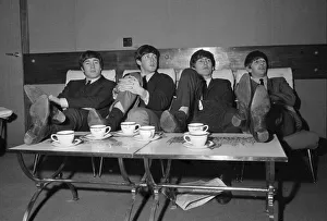 The Beatles relax in their dressing room between the rehearsals for the Royal Variety