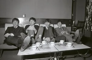The Beatles relax in their dressing room between the rehearsals for the Royal Variety