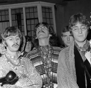 The Beatles Ringo Starr, George Harrison and John Lennon talking to the press