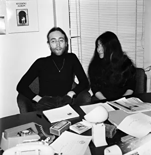00058 Prints: Beatles singer John Lennon with wife Yoko Ono at Apple headquarters as he sends his MBE
