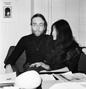 Beatles singer John Lennon with wife Yoko Ono at Apple headquarters as he sends his MBE