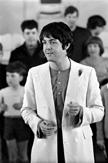 Beatles singer Paul McCartney conducts a brass band. July 1968 Y06397-001