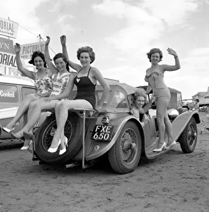 Beauty contest girls playing on the beach at Weston-Super-Mare. 7th September 1960