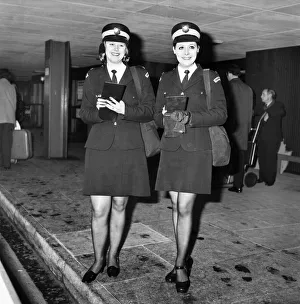 00051 Prints: Beauty Queen Traffic Wardens. Travellers St Londons Heathrow Airport may have their