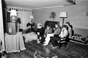 The Bee Gees seen here watching television in their hotel room 17th October 1967