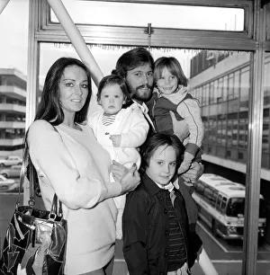 Bee Gees Singer Barry Gibb with his wife Linda and children Travis (12 months)
