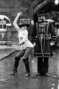 Beefeater Rory Crozier looks on with disbelief as disco dancer Lucia Catti (18