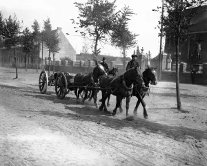 Battles And Campaigns Prints: Belgian civilians help the Belgian military during the German advance by driving gun