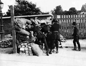 00166 Collection: Belgian soldiers behind a barricade in Brussels 1914 World War One