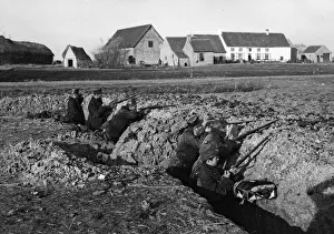 00117 Prints: Belgian soldiers seen here in a hastily constructed trench close to Diksmuide during