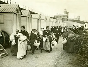 Refugees Prints: Belgian Women refugees carrying their belongins arriving in the belguim town of Ostend