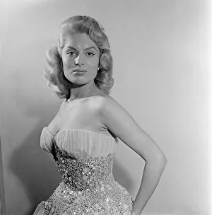 Gown Prints: Belinda Lee, British actress tries on dress designed by Julie Harris