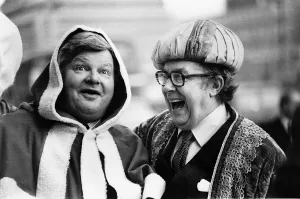 Benny Hill comedian actor joking with Eric Morecambe after they had both been in hospital