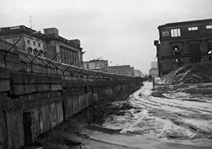 The Berlin Wall was a concrete and earth barrier built by the Soviet Union