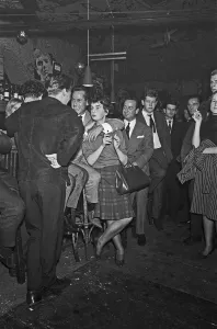 Berliners enjoying a night out at the Old Eden Saloon off of Damaschke Strasse, Berlin
