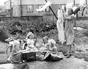 Wash Line Prints: Its best crockery and cakes time for little Rosamund McCloskey who is giving a tea