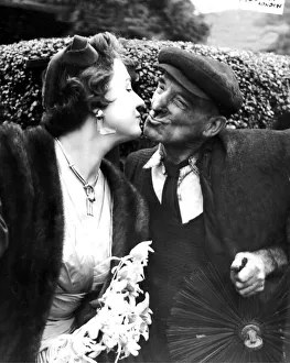 00073 Prints: And the best of luck said 75 year old chimney sweep Sam Black as he kissed the bride