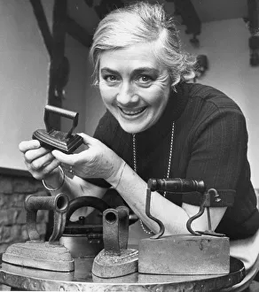 00177 Prints: Bette Trotter collecting antique flat irons at the Stamford Cot pub near Alnwick