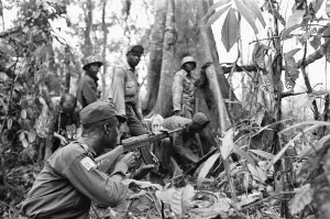 00892 Prints: Biafran soldiers seen here advancing through the jungle towards the Nigerian army