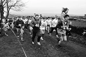 00744 Prints: Big-hearted charity runners took time out of their Christmas celebrations for a good
