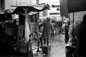 Retail Trade Prints: Last of the big spenders at Petticoat Lane. This lady stall holder uses a box to keep up