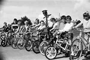 Cycles Prints: On your bike These youngsters are putting their summer holidays to good use by getting