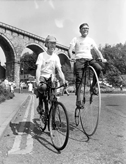On their bikes, pensioners Tom Young aged 76 on his penny farthing