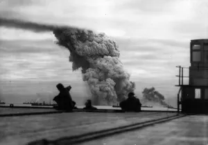 Billowing smoke marks the end of the ammunition ship Mary Luckenbach
