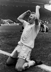 Billy Bremner celebrates after scoring against Wolves at Maine Road to put Leeds through