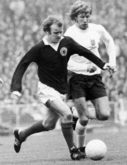 Billy Bremner and Colin Bell clash during the home international between England