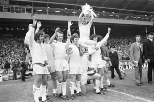 Billy Bremner Leeds United captain is lifted by his team mates with the F. A