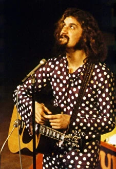 Images Dated 1st March 1976: Billy Connolly on stage with guitar March 1976 A©mirrorpix