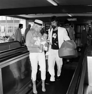 01238 Prints: Billy Connolly and his wife Pamela Stephenson and their baby daughter Daisy arriving