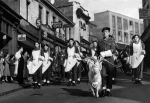 Billy the goat in perfect step with his Goat Major Lieutenant Corporal Howard Bodinnar of