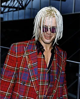 00517 Prints: Billy Idol Singer leaving Heathrow Airport for Paris where he is to do a show Dbase