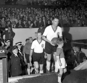 Billy Liddell leads out the stars for his testimonial match at Anfield