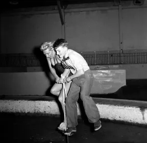 Circuses Prints: Billy Smarts Circus Jumping on a pogo stick December 1957