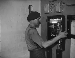 Pottery Prints: Bilston Pottery 1958 A worker inspects the controls for the electrical operated