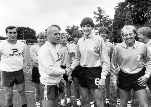 Birmingham City football manager Ron Saunders greets striker Mick Harford