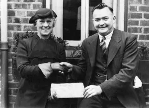 00469 Prints: Birmingham City football star Joe Bradford presents a cheque for &pound