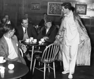 00471 Prints: Birmingham City footballer Eddie Brown modelling pyjamas and dressing gown at a men