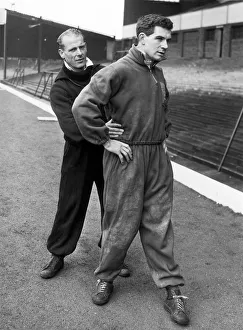 00469 Prints: Birmingham City footballer Eddie Brown receives attention from assistant trainer Doug