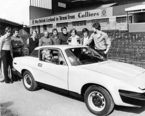 Birmingham City footballers looking at the new TR7 Sports car that one of them could win
